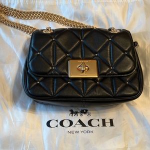 Coach medium convertible crossbody with gold chain. Black.